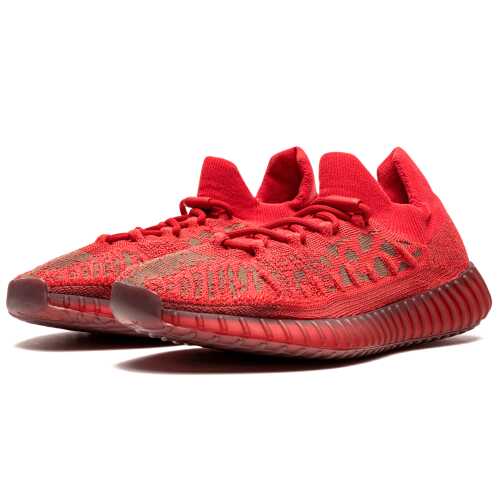 The adidas Yeezy Boost 350 V2 CMPCT “Slate Red” is a monochromatic red colorway of Kanye West’s casual shoe in a modified, streamlined design. A February 2022 release, the “Slate Red” Yeezy Boost 350 V2 Compact succeeds the shoe’s launch colorway, the “Slate Blue.” Like its predecessor, the “Slate Red” appears in a design that utilizes similar components of the original 350 V2 but with a few alterations. The Primeknit upper appears in a similar style to the adidas Yeezy Basketball Knit shoe and features shades of eye-grabbing red. The 350 V2 CMPCT is equipped with a traditional lacing setup in spite of its sock-like appearance, albeit designed in a “quick-lace” style that is a departure from the look of the original 350 V2. Like that shoe, however, the Compact is complete with a full-length Boost cushioned midsole. The “Slate Red” joins the adidas Yeezy Foam Runner “Vermillion” in reigniting West’s penchant for all-red-everything sneakers, a trend the Chicago native helped popularize with his Nike Air Yeezy 2 “Red October” in the early 2010s.